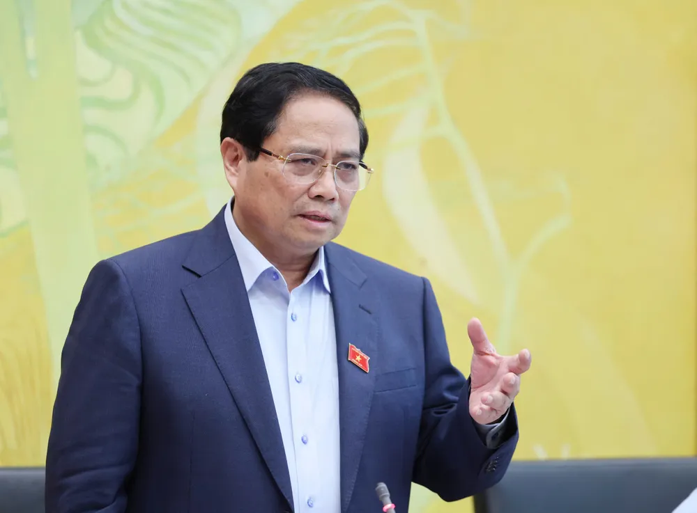 Thủ tướng Phạm Minh Chính phát biểu tại phiên thảo luận tổ, sáng 23-5. Ảnh QUANG PHÚC.jpg