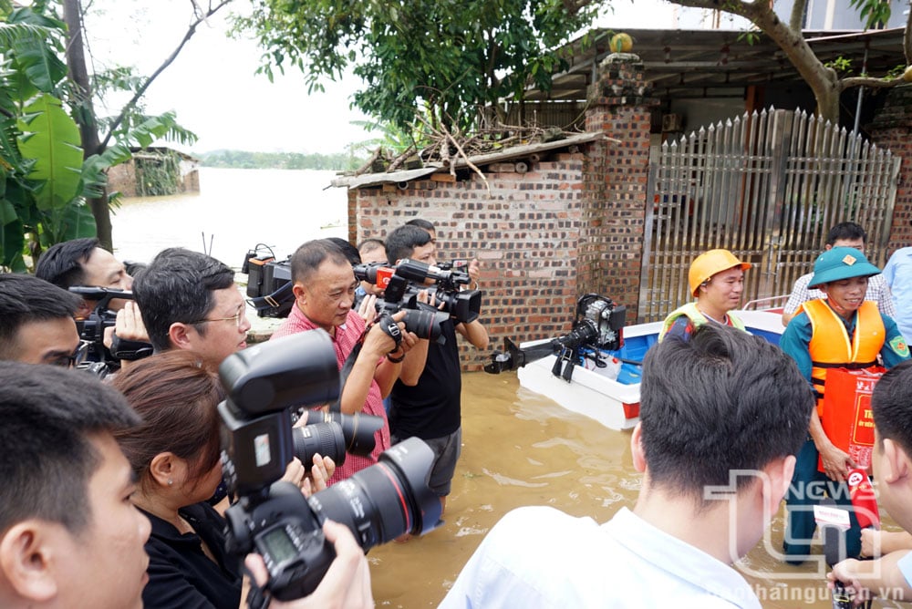 Journalists are present at the scene to record and convey true information to the public.