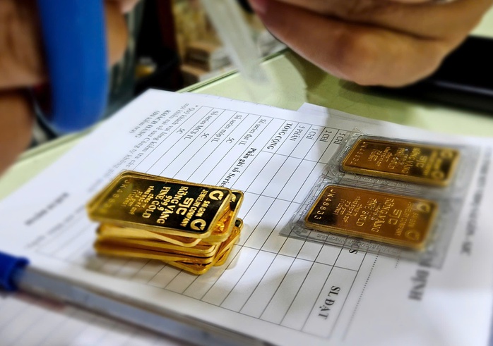 Giá vàng miếng SJC, vàng nhẫn thấp nhất trong nhiều ngày - Ảnh 1.