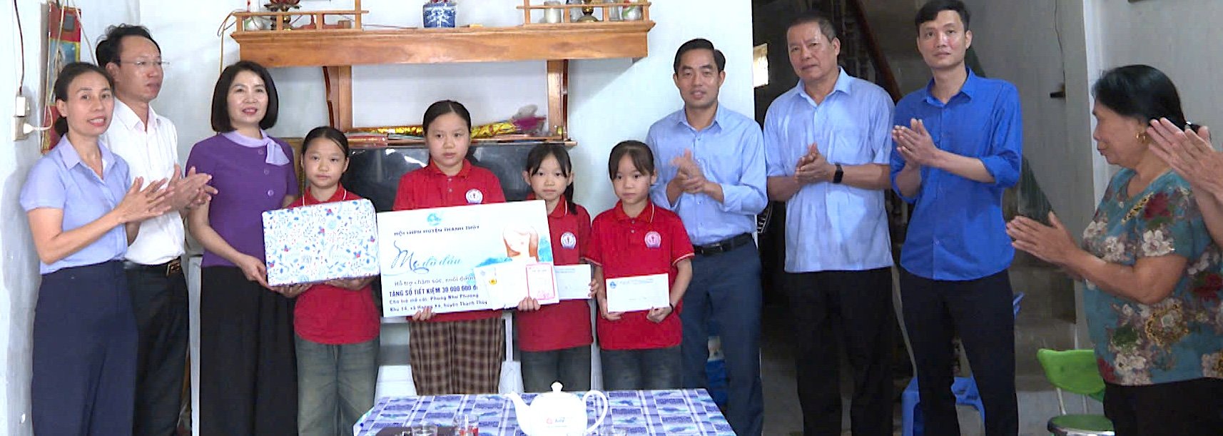 Giving savings books to orphans on the occasion of International Children's Day June 1