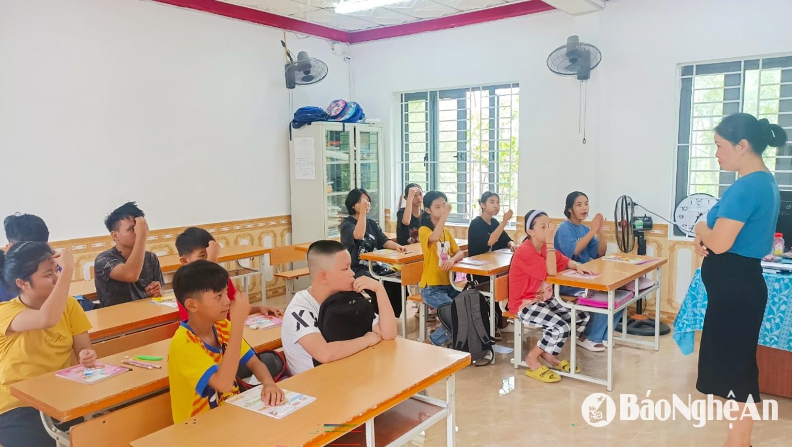 Enseignement de la culture selon le programme d'éducation spécialisée du Centre provincial de formation professionnelle pour personnes handicapées. Photo : Minh Quan