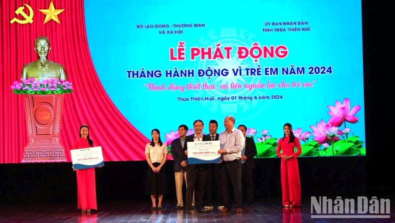 Le vice-Premier ministre Tran Hong Ha assiste à la cérémonie de lancement du Mois d'action pour les enfants 2024 photo 3