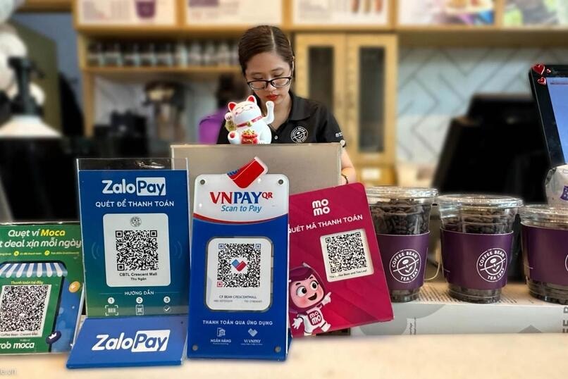 ការទូទាត់កូដ QR រីកដុះដាល ការដកសាច់ប្រាក់ធ្លាក់ចុះយ៉ាងខ្លាំង