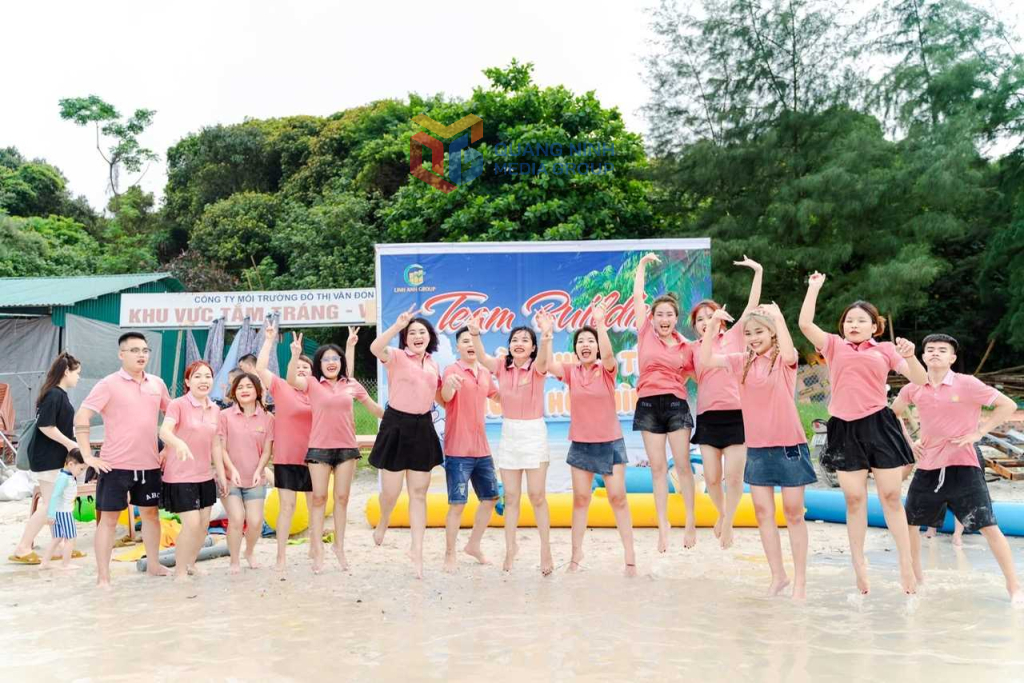 Tourists participate in activities at Minh Chau beach, Van Don district.