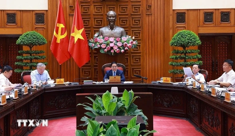Thủ tướng Phạm Minh Chính chủ trì cuộc họp với các bộ, ngành để chuẩn bị đàm phán thương mại với Hoa Kỳ. (Ảnh: Dương Giang/TTXVN)