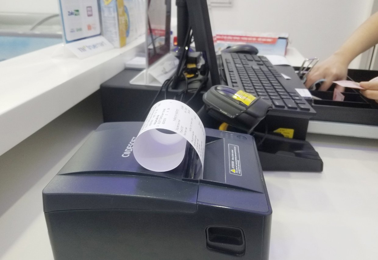 Cục Thuế đề nghị các tổ chức cung cấp giải pháp hóa đơn điện tử mở rộng một số chương trình ưu đãi, hỗ trợ miễn phí cho các hộ kinh doanh. Ảnh: VIỆT AN