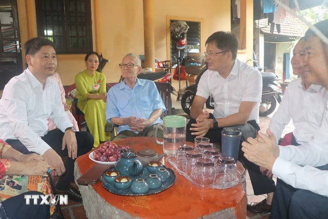 ttxvn-nha-bao-tran-van-hien-2.jpg