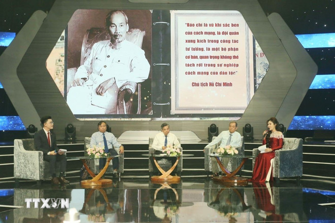 ttxvn-giao-luu-toa-dam-bao-chi-cach-mang-trong-ky-nguyen-vuon-minh-1606.jpg