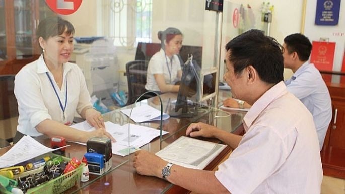 Việc thành lập Trung tâm phục vụ hành chính công giúp Hà Nội giảm mạnh số lượng công chức, viên chức tại bộ phận "một cửa". (Ảnh: MINH THU)