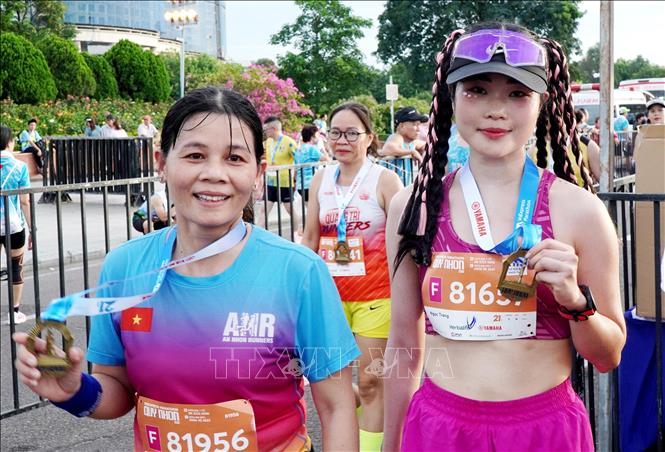 12.000 vận động viên tranh tài tại giải chạy VnExpress Marathon Quy Nhơn 2025 - Ảnh 3.