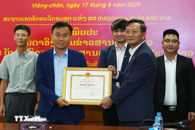 ttxvn-hop-tac-bao-chi-viet-nam-lao-2.jpg