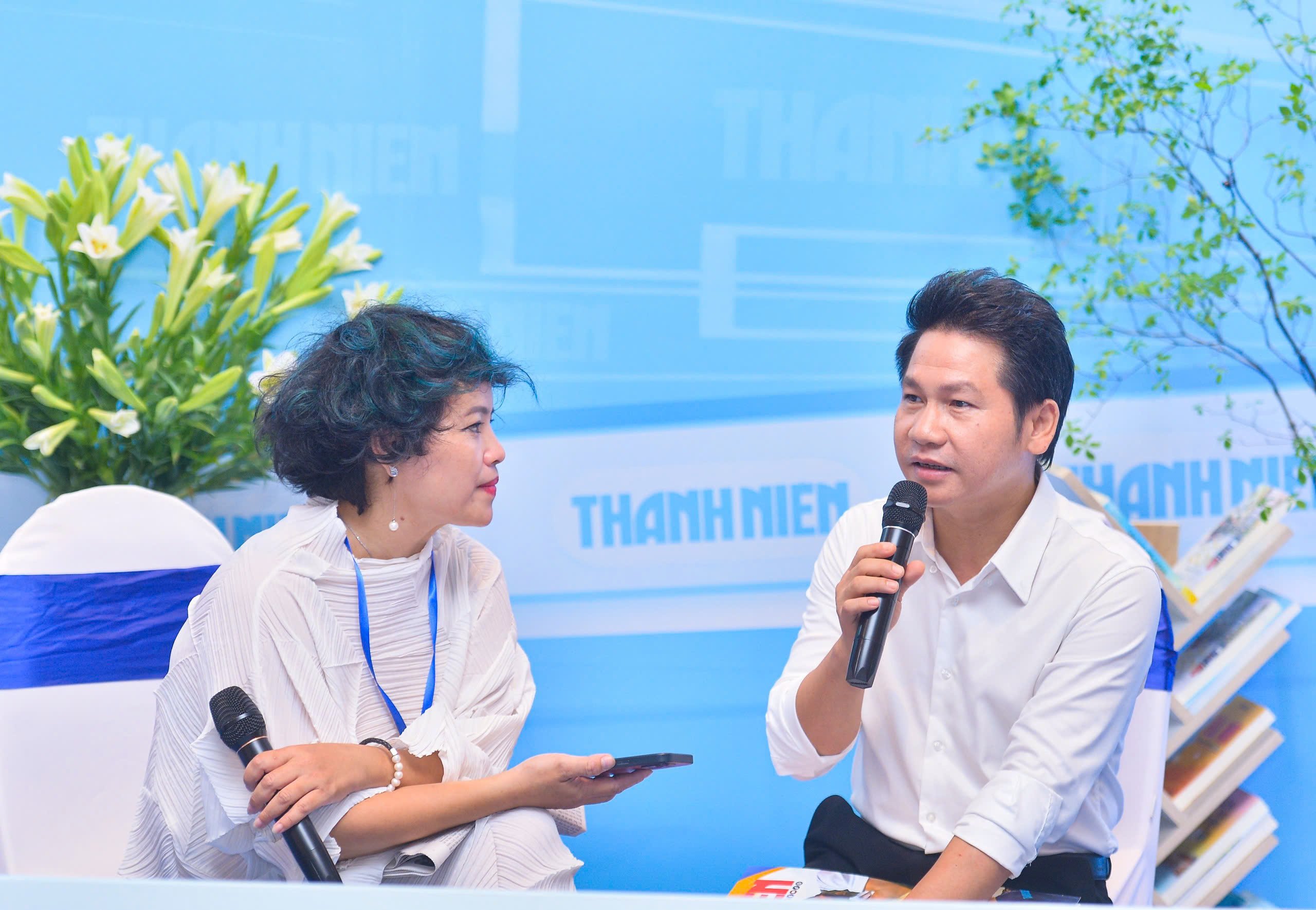 Ca sĩ Trọng Tấn giao lưu cùng độc giả Báo Thanh Niên tại Hội Báo toàn quốc- Ảnh 11.
