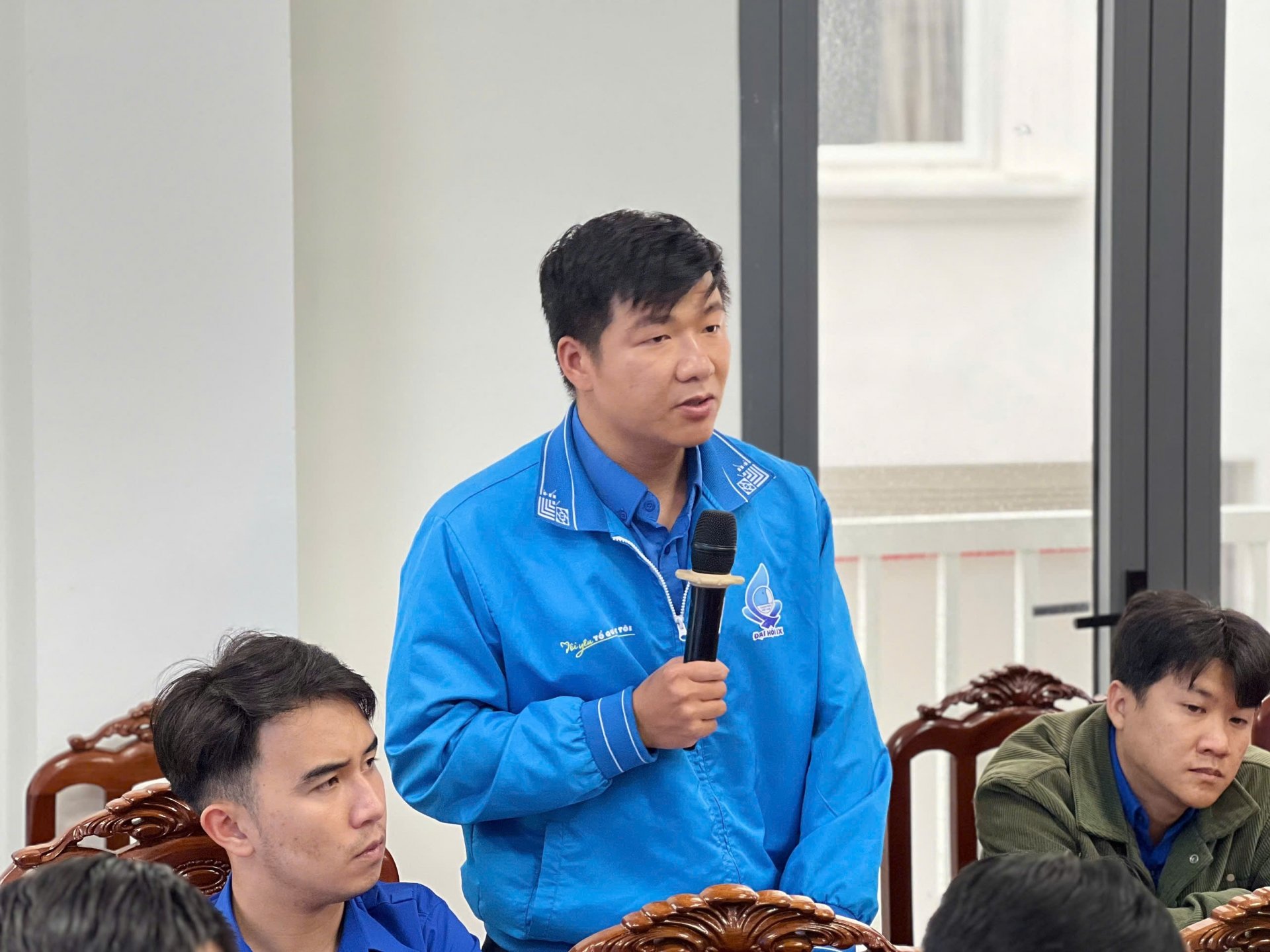 Delegates giving opinions at the Conference