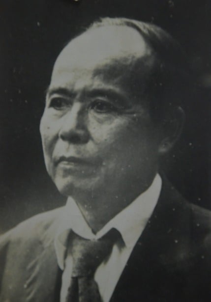Di ảnh cố nhà báo Huy Trợ.