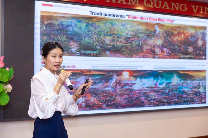 La periodista Thi Uyen habla sobre la publicación especial de Nhan Dan, que conmemora el 70.º aniversario de la victoria de Dien Bien Phu. (Foto: Minh Son)