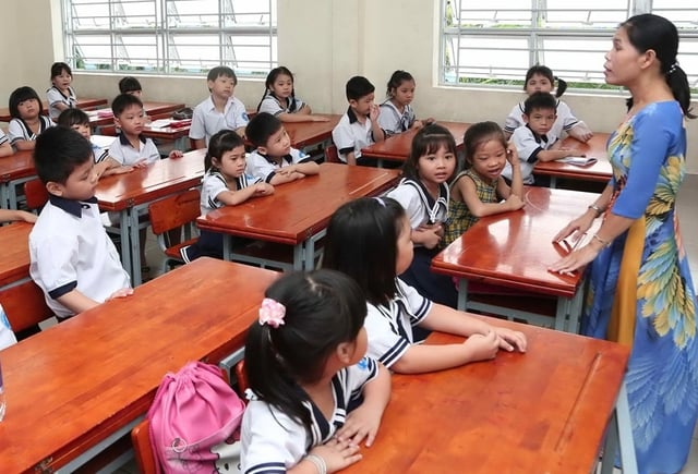 Hà Nội dự kiến hỗ trợ bữa ăn bán trú cho học sinh tiểu học- Ảnh 1.