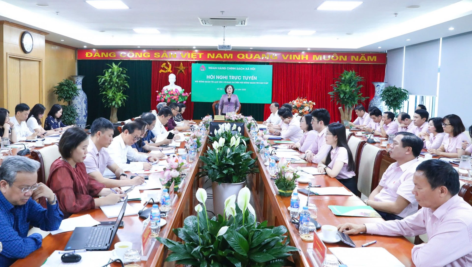 Quang cảnh chương trình làm việc của HĐQT NHCSXH Việt Nam với Ban đại diện HĐQT NHCSXH các cấp