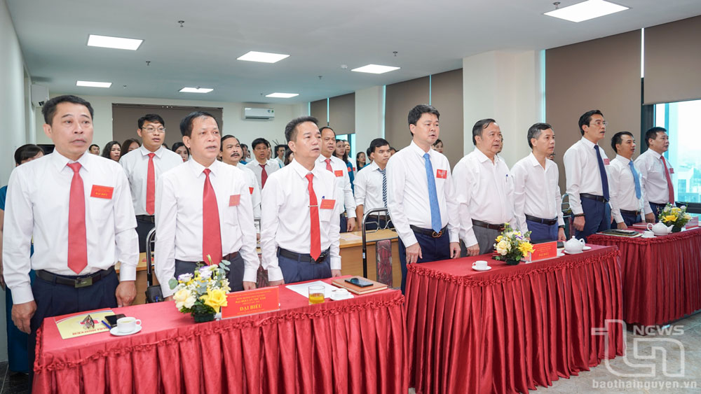 Delegates perform the Flag Salute ceremony at the Congress.