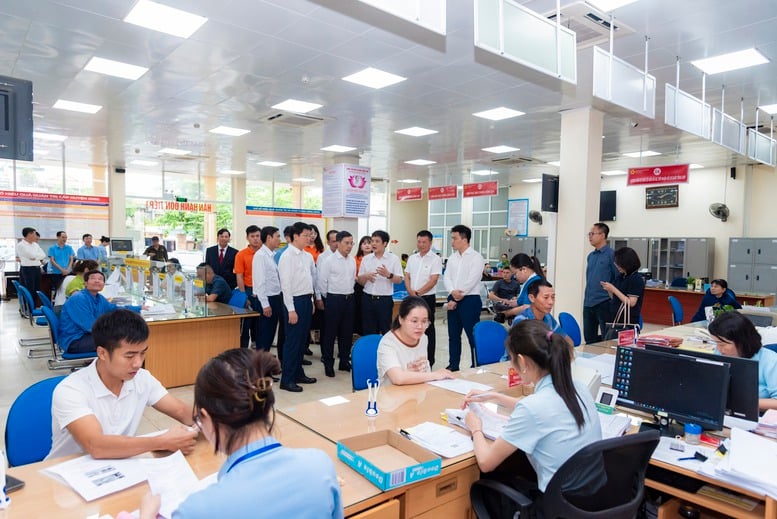 FPT cùng Quảng Ninh triển khai mô hình chính quyền 2 cấp và Trung tâm PVHCC một cấp- Ảnh 1.