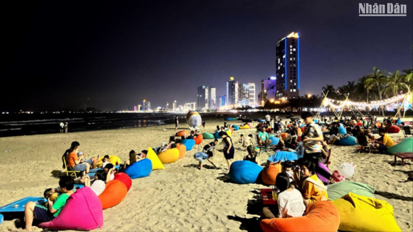 An entertainment and dining area on Man Thai beach, Da Nang at night.