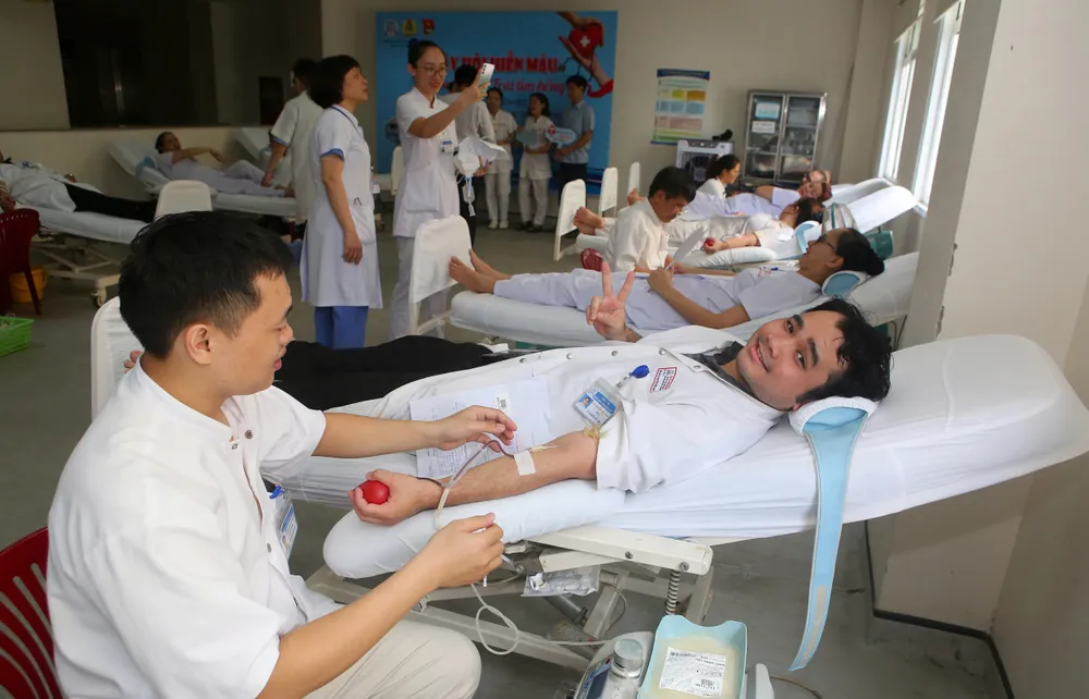 Doctors and nurses of Hue Central Hospital donate blood and platelets at the program 