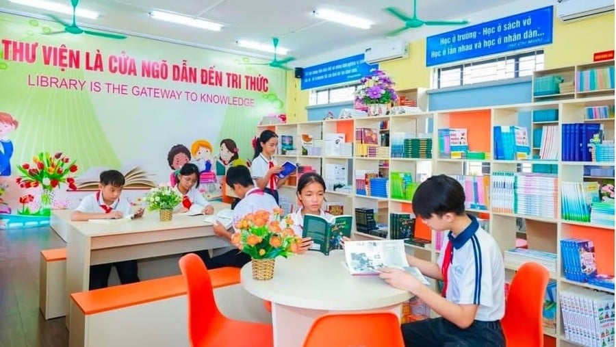 Học sinh Trường THCS Bắc Bình (Thái Hòa, Phú Thọ) đọc sách tại thư viện nhà trường.