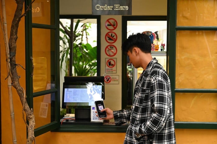 Du lịch không tiền mặt - Chỉ cần TPBank: Quét QR, chi tiêu xuyên biên giới- Ảnh 1.