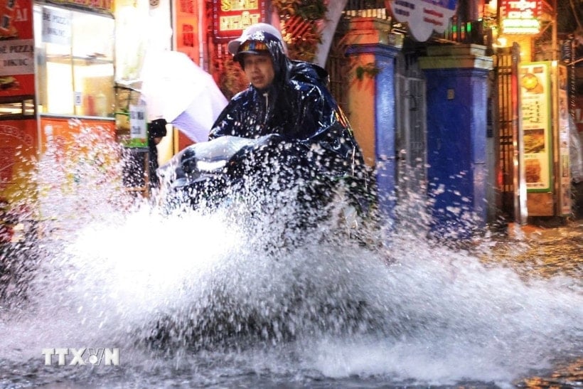 Rain and thunderstorms are expected in areas across the country. (Photo: Tuan Anh/VNA)