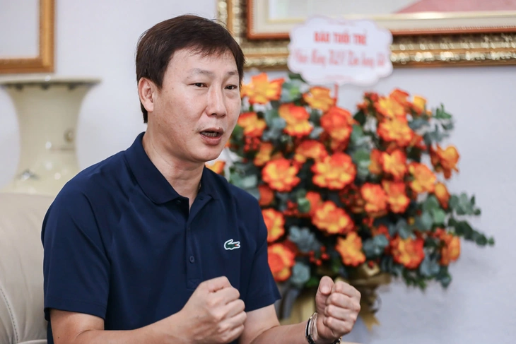 Kim Sang Sik - Ảnh 2.