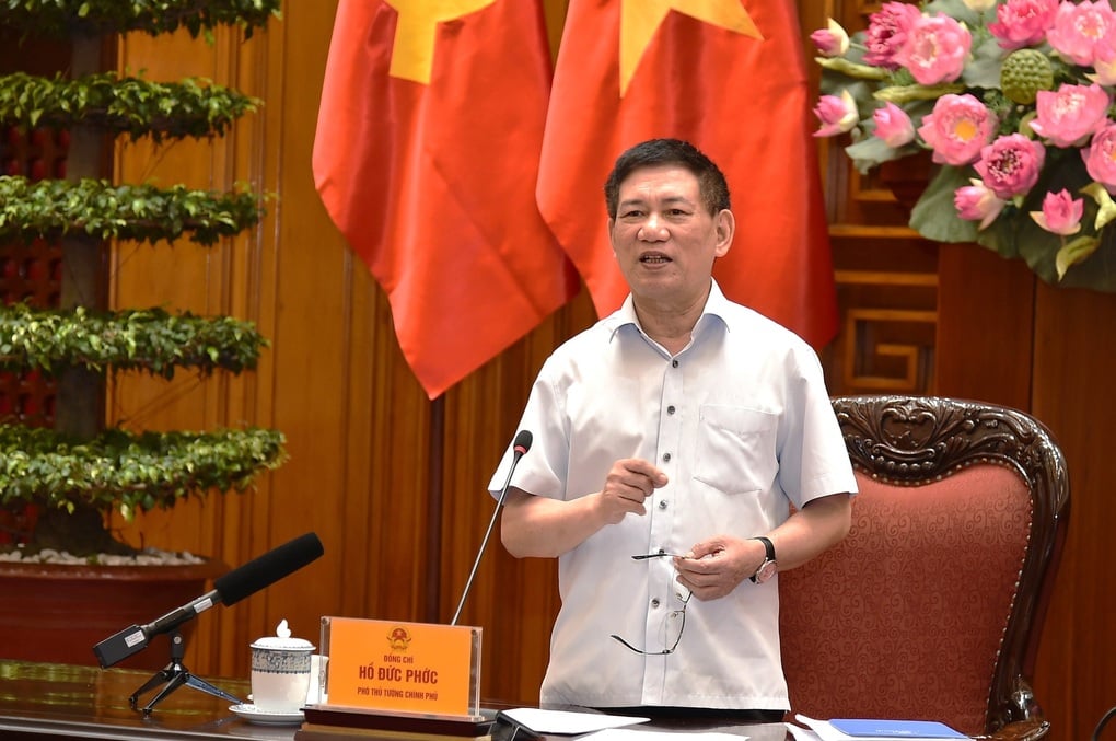 Phó Thủ tướng họp với doanh nghiệp về tính thuế chuyển nhượng BĐS, cổ phiếu - 1