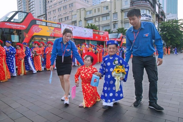 Lễ cưới tập thể của 82 cặp đôi trong Ngày Phụ nữ Việt Nam - Ảnh 3.