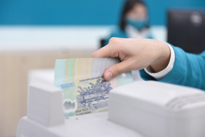 UOB kỳ vọng Ngân hàng Nhà nước sẽ giữ nguyên lãi suất chính sách hiện tại, với lãi suất tái cấp vốn được duy trì ở mức 4,50%. (Ảnh: Vietnam+)
