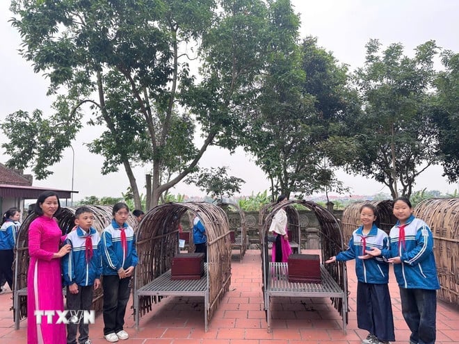 ttxvn-van-mieu-mao-dien.jpg