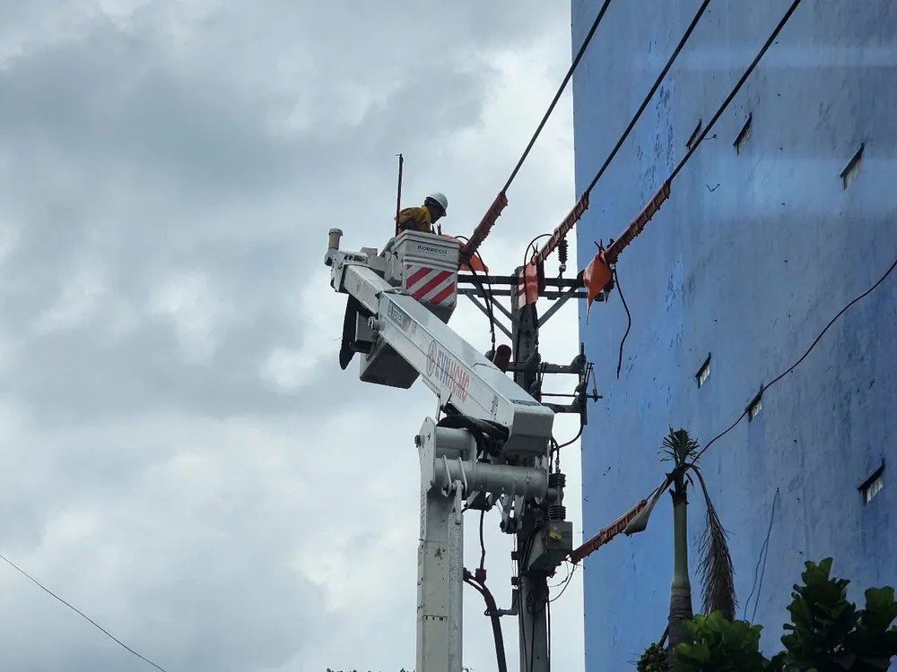 Ho Chi Minh City Electricity staff repair the power grid in An Hoi Tay ward.