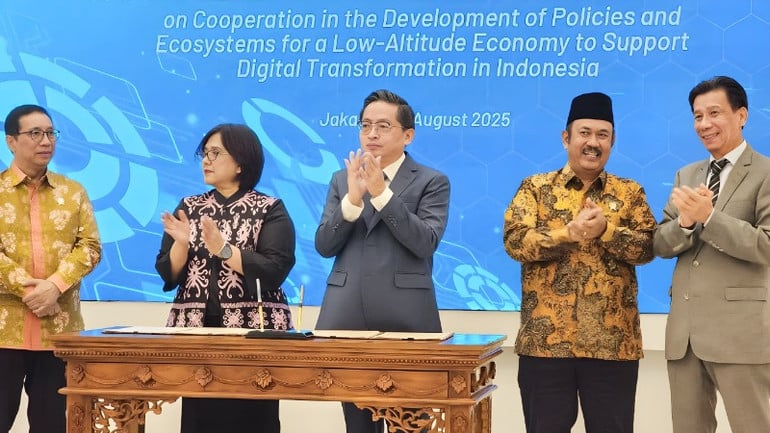 hinh-1-ky-ket-indo-1433.jpg