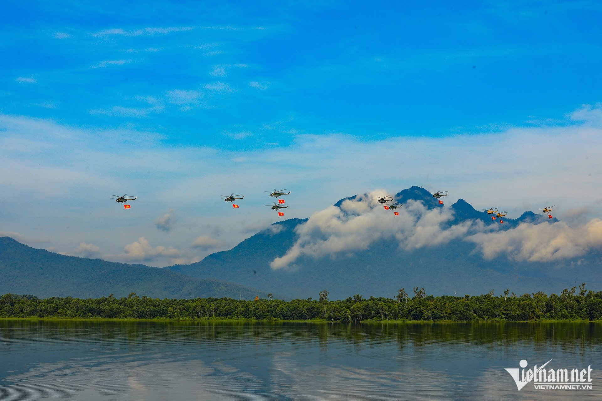 For the first time, 10 helicopters flew in formation to raise the flag in preparation for National Day, September 2nd.