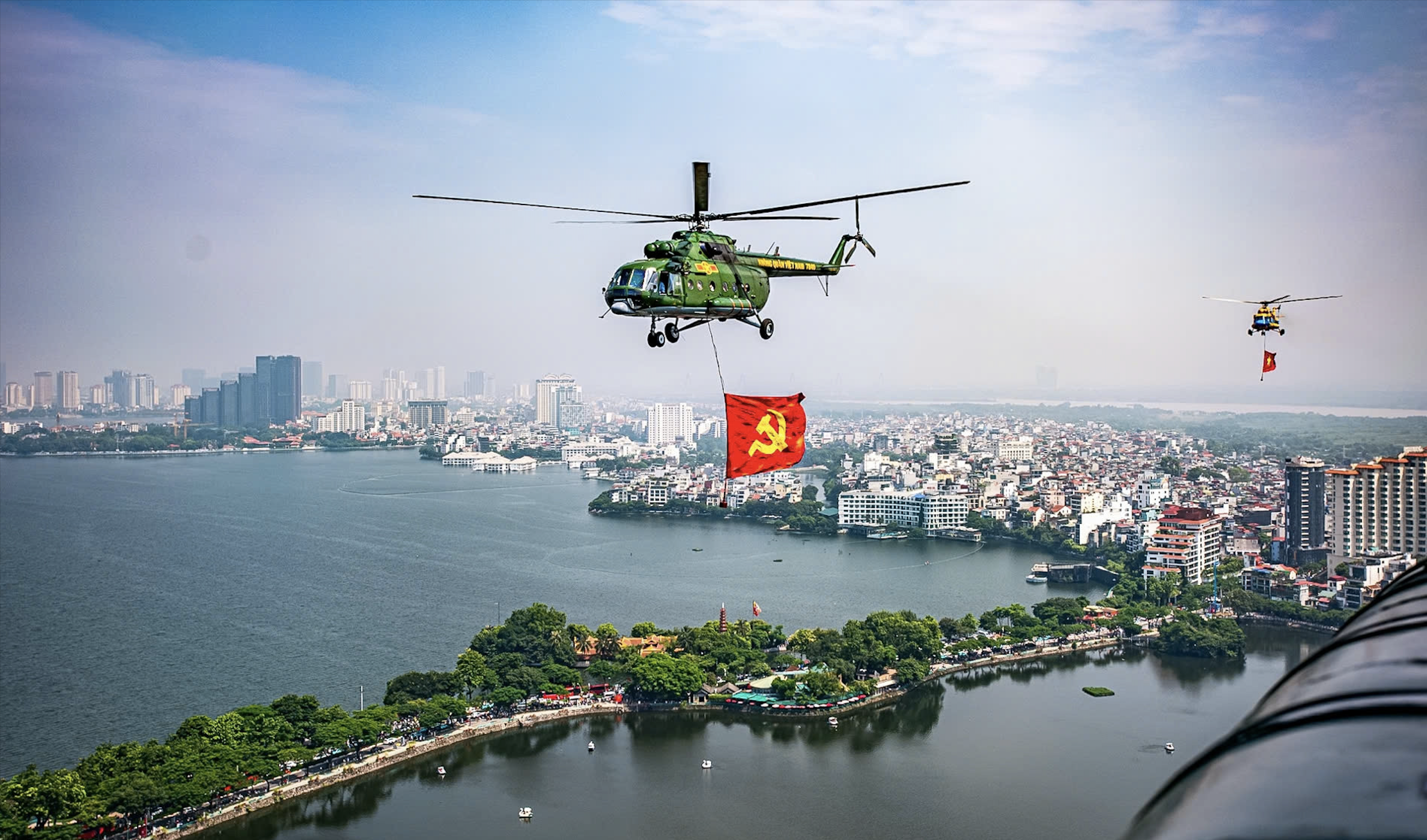 Ancient and modern Hanoi under the flag seen from a helicopter