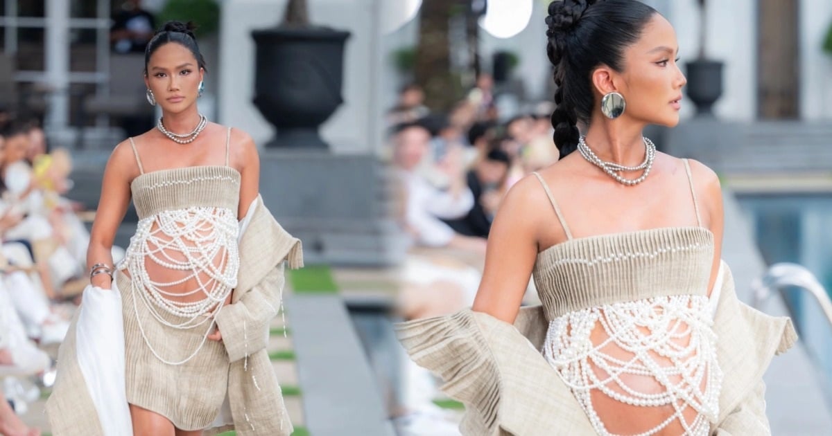 H'Hen Nie shows off her pregnant belly on the catwalk before going on maternity leave