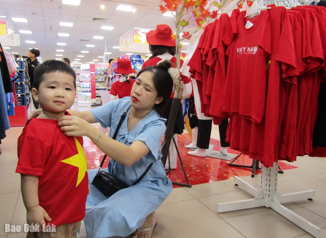 Many families buy red flag and yellow star costumes to celebrate the holiday together.