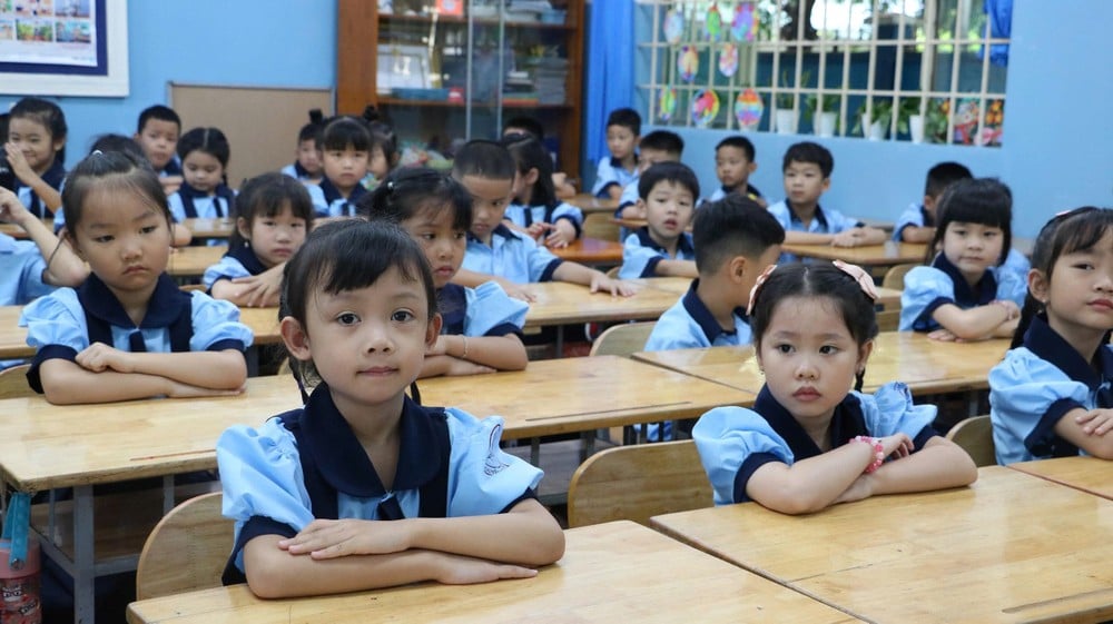 Schüler der Nguyen Van Triet Primary School (Linh Xuan Ward, HCMC) am ersten Tag des neuen Schuljahres am Morgen des 20. August.