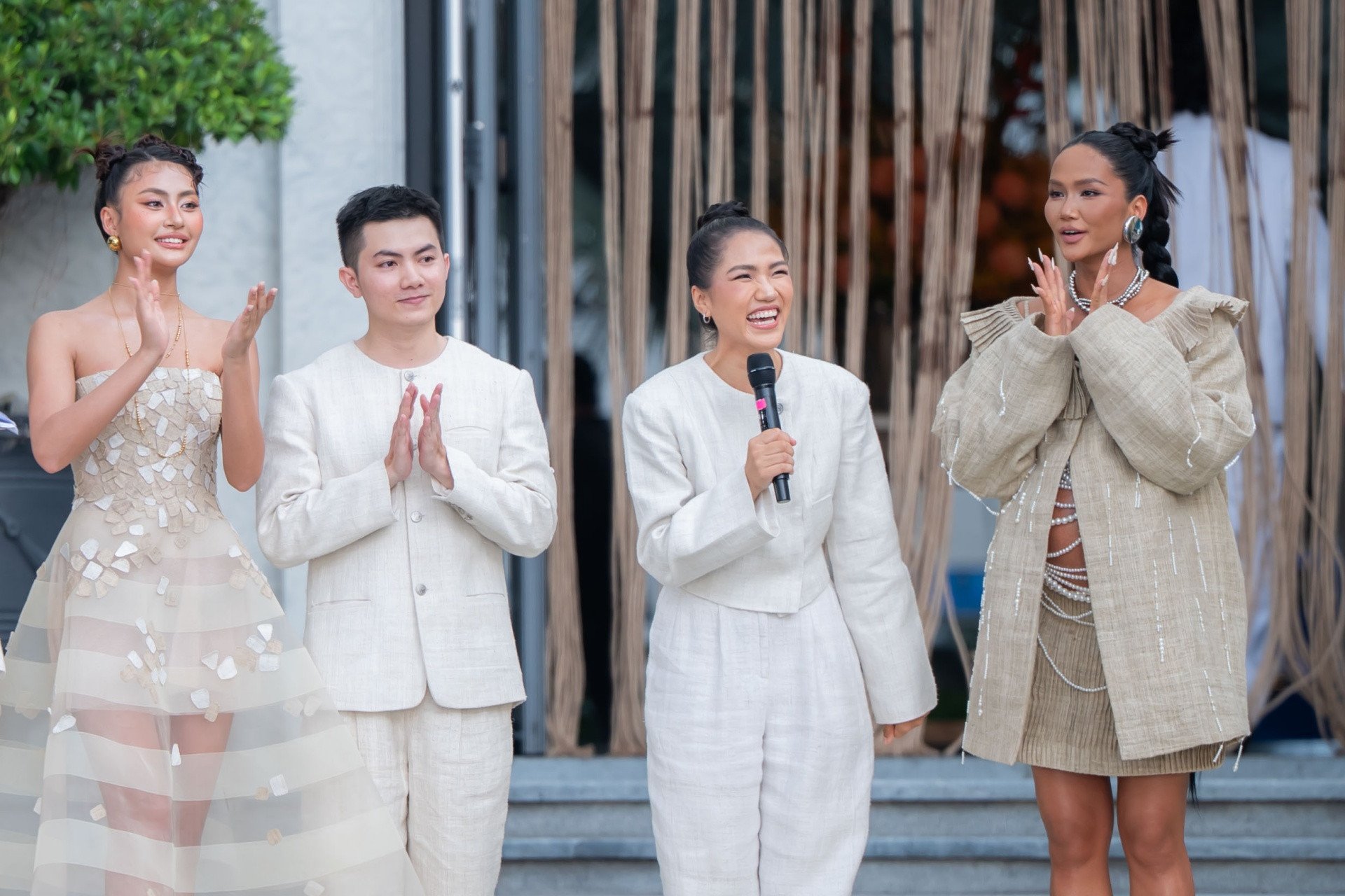H'Hen Niê khoe bụng bầu trên sàn catwalk, được ông xã chăm sóc 'tận răng' - Ảnh 3.