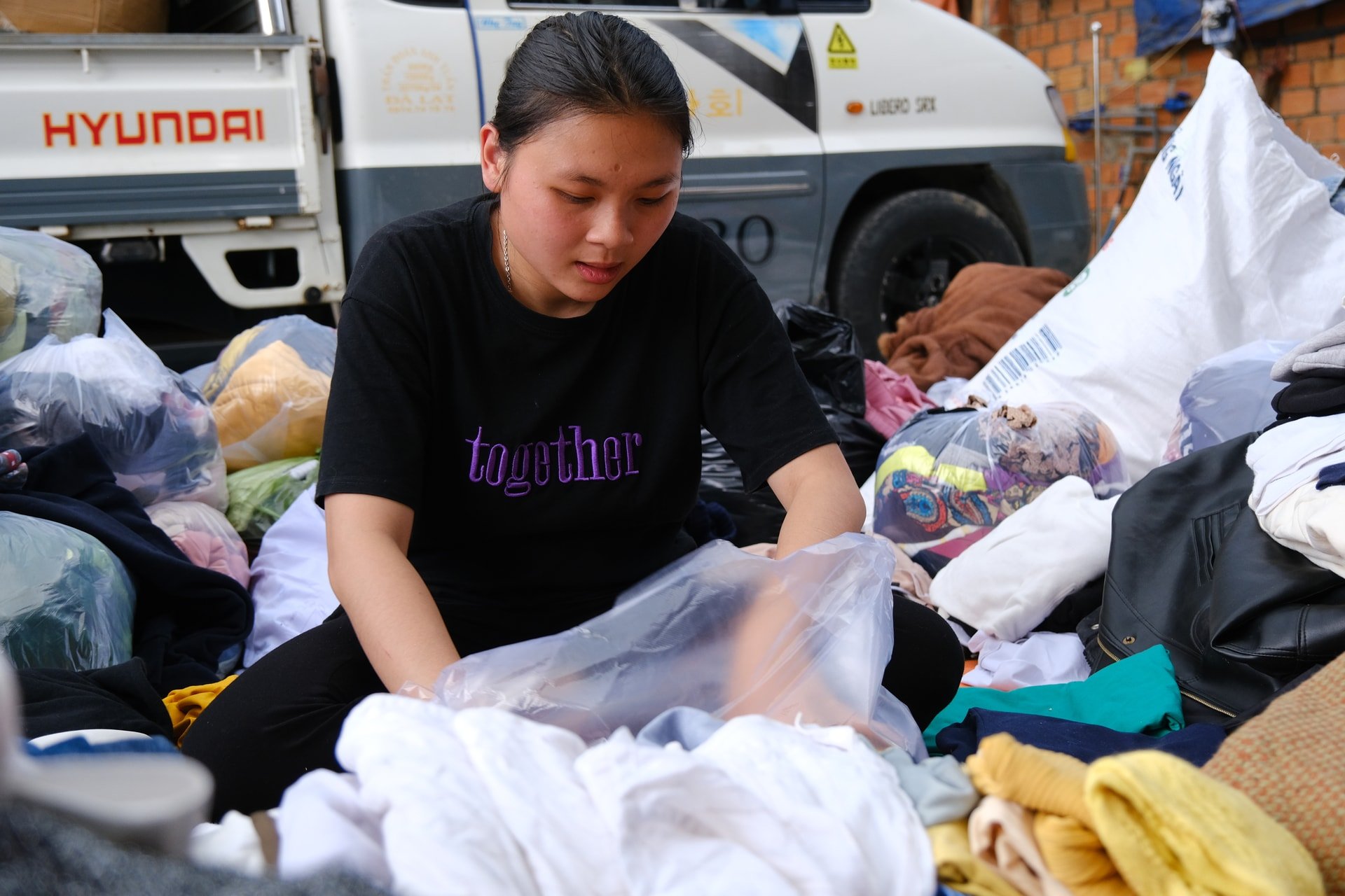 Volunteers prepare necessities before departure.