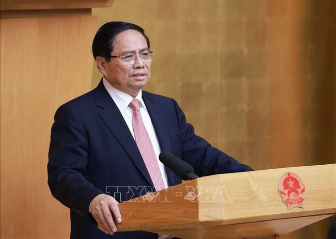នាយករដ្ឋមន្ត្រី Pham Minh Chinh ធ្វើជាប្រធានកិច្ចប្រជុំលើកទី 20 នៃគណៈកម្មាធិការដឹកនាំរដ្ឋសម្រាប់គម្រោងជាតិសំខាន់ៗ និងការងារក្នុងវិស័យដឹកជញ្ជូន។ រូបថត៖ Duong Giang/VNA