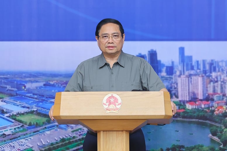 នាយករដ្ឋមន្ត្រី Pham Minh Chinh ប្រធានក្រុមប្រឹក្សាសម្របសម្រួលតំបន់ដីសណ្ដទន្លេក្រហមបានដឹកនាំកិច្ចប្រជុំលើកទី៦របស់ក្រុមប្រឹក្សា - រូបថត៖ VGP/Nhat Bac