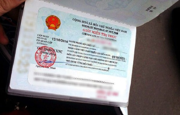 Giảm thời gian cấp Giấy miễn thị thực xuống còn 1 ngày- Ảnh 1.