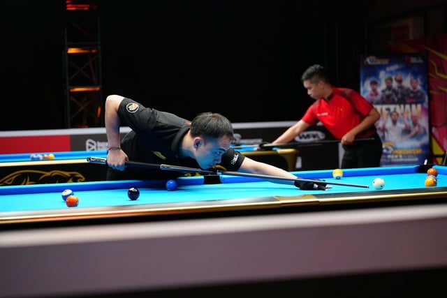 Hai tay cơ Việt Nam đi tiếp ở giải billiards vô địch thế giới 10 bi nam - Ảnh 2.