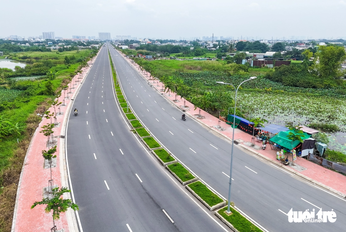 Panorama នៃការពង្រីកផ្លូវហាយវេ 50 - ទីក្រុងហូជីមិញ 'នាំមកកាន់តែជិត' Tay Ninh ជាមួយនឹងផ្លូវ 6 ផ្លូវមុនអាណត្តិថ្មី - រូបថត 1 ។