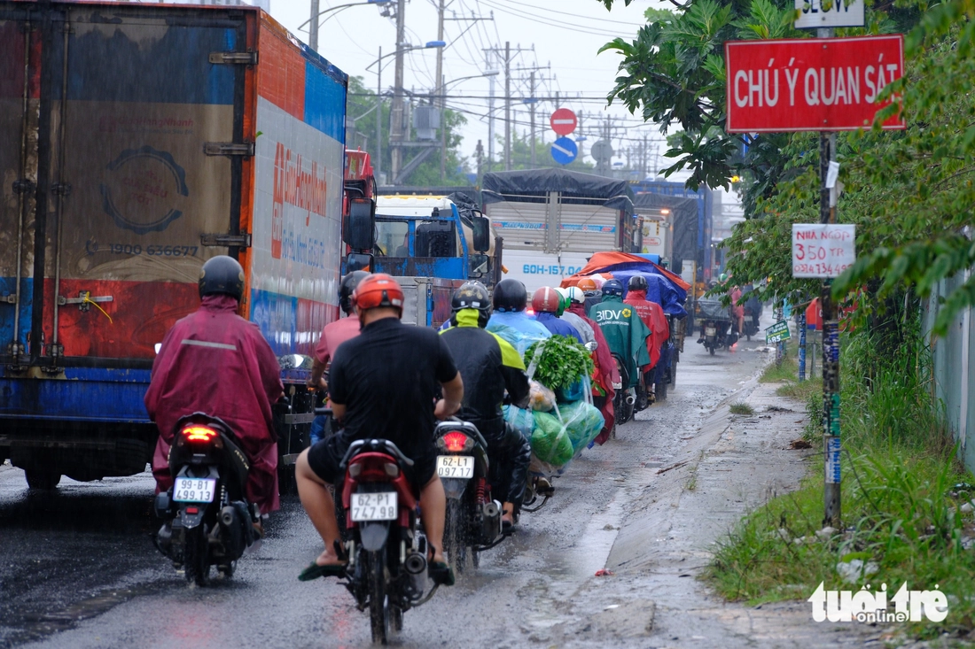 Mong mỏi mở đường Nguyễn Văn Bứa đang quá tải giữa TP.HCM - Tây Ninh - Ảnh 6.