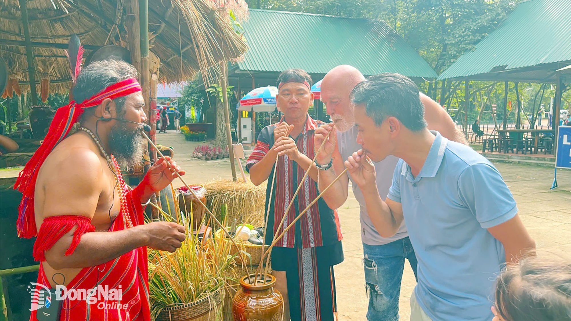 Domestic and international tourists get drunk on the Stieng people's wine.