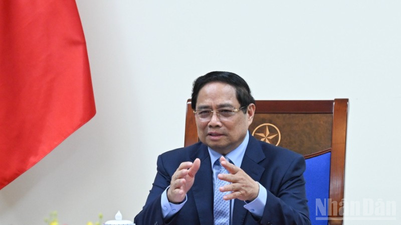 Prime Minister Pham Minh Chinh had a phone call with Chancellor of the Federal Republic of Germany Friedrich Merz. (Photo: Tran Hai)